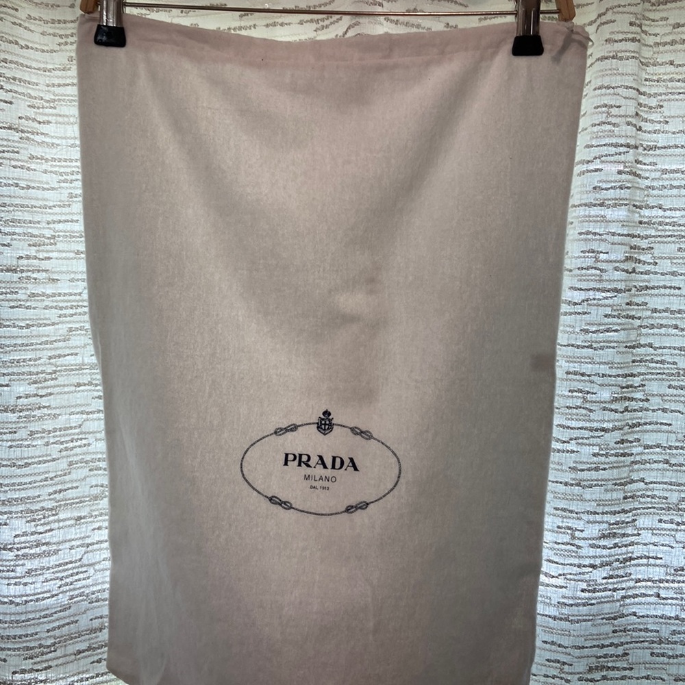 Prada.White dusty bag (53x38 in)